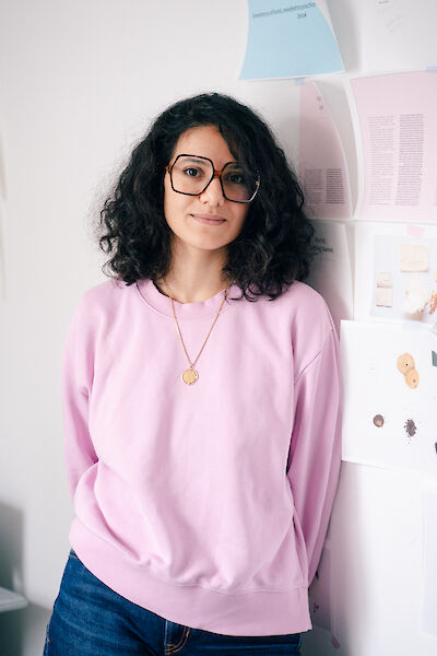 Portrait of the artist in her studio.
